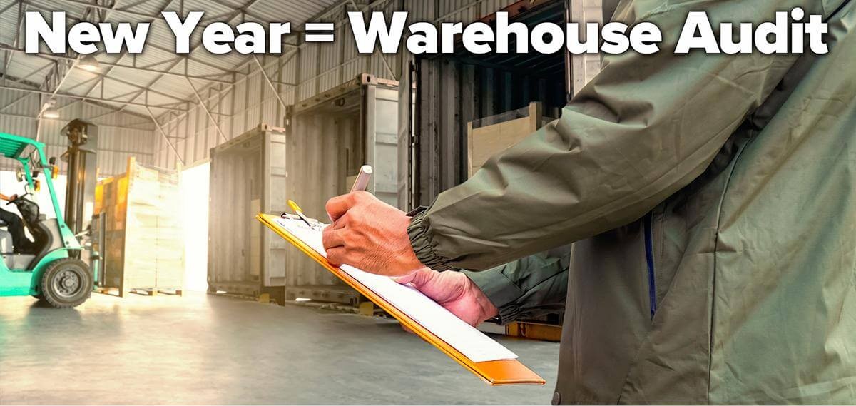 New Year New Wearhouse Audit [person in warehouse dock checking off on a clipboard]