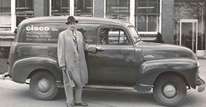 AG Morrison in front of an delivery van